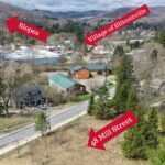 Aerial view of Ellicottville village with slopes